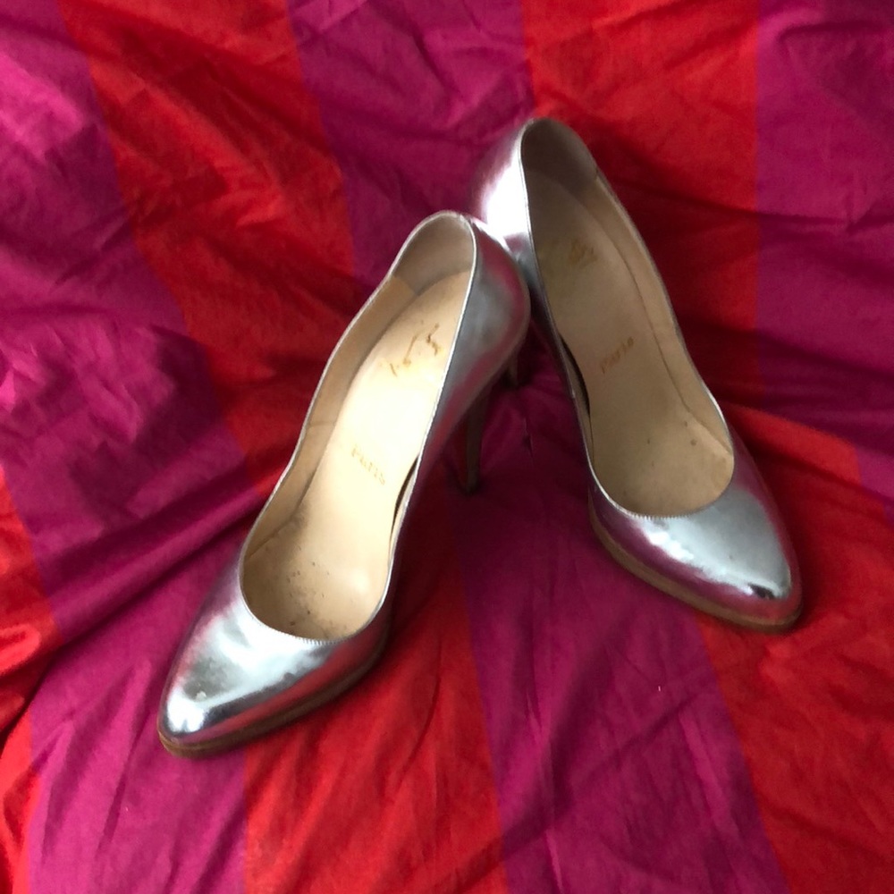 Silver Christian Louboutins.